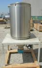 Used Dri Air desiccant dryer, model HP4-X 150. Rated 150 cfm. 3/575/25 amp. Includes a Dri-Air 400 pound 304 stainless steel insulated drying  hopper, model RH400, mounted on a stand.