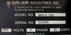 Used Dri Air desiccant dryer, model HP4-X 150. Rated 150 cfm. 3/575/25 amp. Includes a Dri-Air 400 pound 304 stainless steel insulated drying  hopper, model RH400, mounted on a stand.