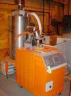 USED: Motan model MDD100 desiccant dryer. Has approximately 300 lb aluminum hopper with stainless steel skin and pneumatic receiver. Includes controls for loading, rated at 120 lbs per hour. 6 kw hea...