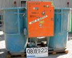 Used Unadyn Dehumidifier Dryer, Model DHD-10060. Dual desiccant beds. 2500 process CFM. 3/60/460 Volt. Includes a control panel, 5000 pound 2 section drying hopper and a cyclone.