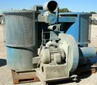 Used Unadyn Dehumidifier Dryer, Model DHD-10060. Dual desiccant beds. 2500 process CFM. 3/60/460 Volt. Includes a control panel, 5000 pound 2 section drying hopper and a cyclone.