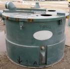 Used Unadyn Dehumidifier Dryer, Model DHD-10060. Dual desiccant beds. 2500 process CFM. 3/60/460 Volt. Includes a control panel, 5000 pound 2 section drying hopper and a cyclone.
