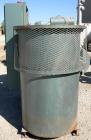 USED: Unadyn dehumidifier dryer, model DHD-60. Dual desiccant beds. 1500 process cfm. 3/60/460 volt. Includes a control panel with touch screen, 5000 pound 2 section drying hopper, an afterheater and...