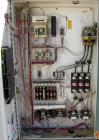 USED: Unadyn dehumidifier dryer, model DHD-60. Dual desiccant beds. 1500 process cfm. 3/60/460 volt. Includes a control panel with touch screen, 5000 pound 2 section drying hopper, an afterheater and...