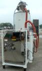 USED: Una-Dyn automatic mini dryer, model UDC100. Dual desiccant beds. Approximately 180 to 250 degrees F. temperature range. 3/60/460 volt, 23.8 amp, 18.9 kva. Includes a 400 pound modular hopper, m...