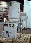 Used Una-Dyn Closed Circuit Crystallizer, Model XTLR-600, Carbon Steel. Approximate through-put 600 pounds per hour. Includes an insulated drying hopper, agitator arm assembly with motor, 5hp blower,...