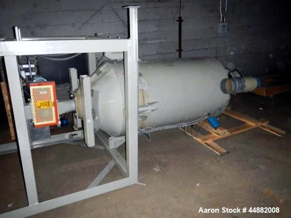 Used Conair Model CR1000 Crystallizer rated at 1000 lbs per hour.  Includes approximately 3500 lb agitated hopper, operator control panel and heater / cooler unit with blower.