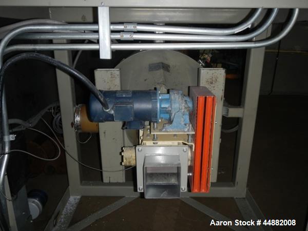 Used Conair Model CR1000 Crystallizer rated at 1000 lbs per hour.  Includes approximately 3500 lb agitated hopper, operator control panel and heater / cooler unit with blower.