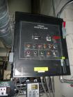 Used Conair Model CR1000 Crystallizer rated at 1000 lbs per hour.  Includes approximately 3500 lb agitated hopper, operator control panel and heater / cooler unit with blower.