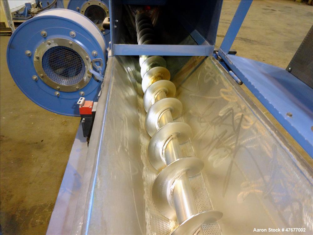 Used Screw pellet cooling conveyor. Bottom perforated holes, top hinged cover, side mounted blowers.