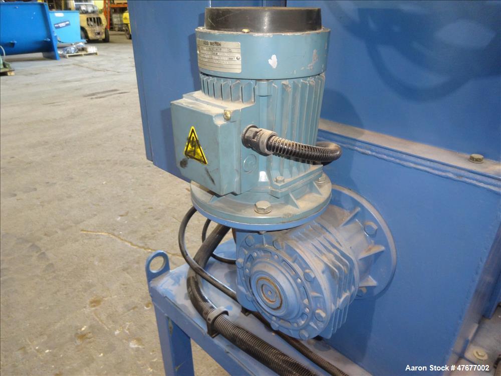 Used Screw pellet cooling conveyor. Bottom perforated holes, top hinged cover, side mounted blowers.