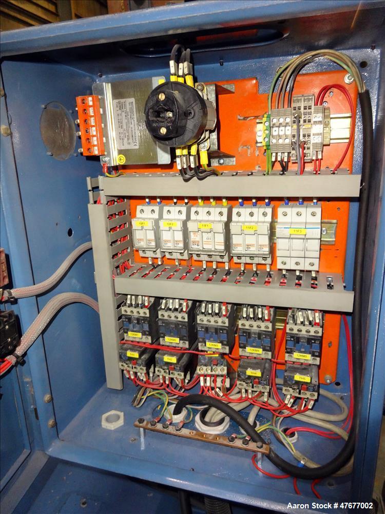 Used Screw pellet cooling conveyor. Bottom perforated holes, top hinged cover, side mounted blowers.