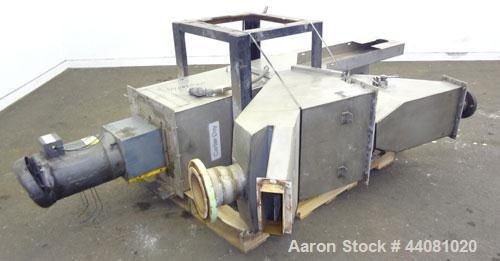 Used Carter Day Spin-Away Spin Dryer, Model CWM2, 304 Stainless Steel. Driven by a 5hp, 3/60/208230/460 volt, 1160 rpm motor. Includes an Agglomerate unit, model DAS2, and a carbon steel stand.