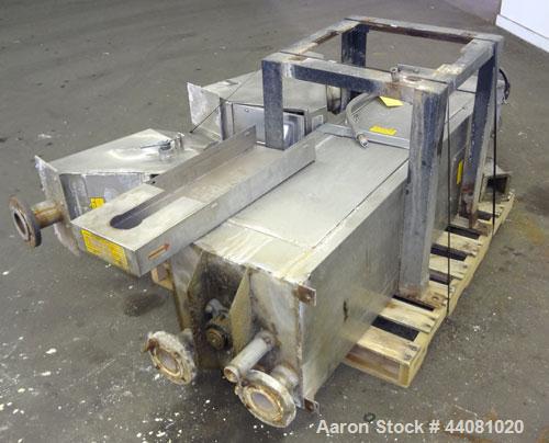 Used Carter Day Spin-Away Spin Dryer, Model CWM2, 304 Stainless Steel. Driven by a 5hp, 3/60/208230/460 volt, 1160 rpm motor. Includes an Agglomerate unit, model DAS2, and a carbon steel stand.