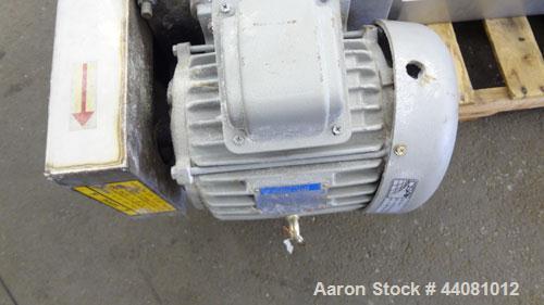 Used Carter Day Spin-Away Spin Dryer, Model DAS2, 304 Stainless Steel. Driven by a 5hp, 3/60/230/460 volt, 1750 rpm motor. Includes an Agglomerate unit, model AU200, and a carbon steel stand.