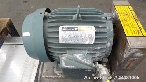 Used Carter Day Spin-Away Spin Dryer, Model DBA2, 304 Stainless Steel. Driven by a 5hp, 3/60/230/460 volt, 1715 rpm motor. Includes an Agglomerate unit, model AU200, and a carbon steel stand.