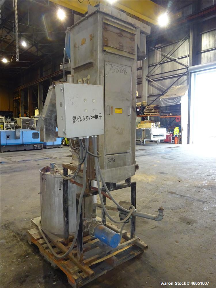 Used Day Spin Dryer, Model DBL2. Approximate 11" diameter x 41" long chamber, driven by a 2 hp, 208-230-460 volt/1725 rpm motor, with water tank. Serial# 127-94.