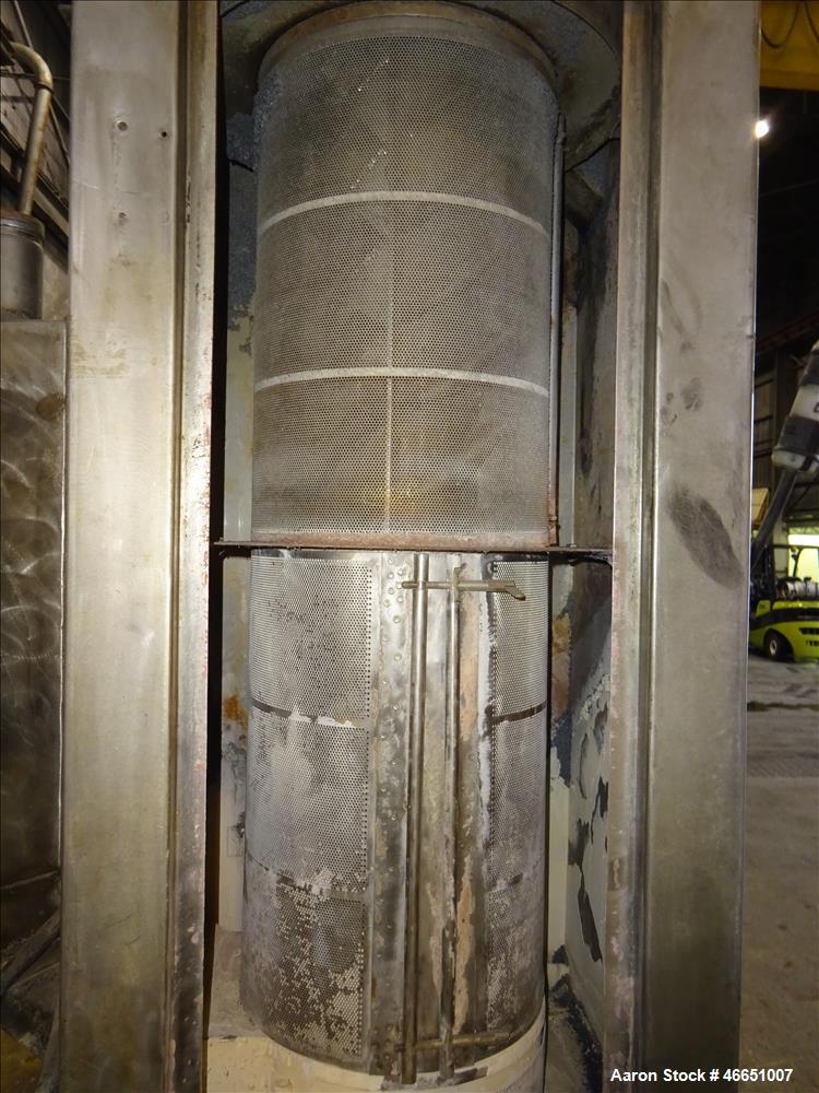 Used Day Spin Dryer, Model DBL2. Approximate 11" diameter x 41" long chamber, driven by a 2 hp, 208-230-460 volt/1725 rpm motor, with water tank. Serial# 127-94.