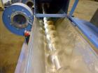 Used Screw pellet cooling conveyor. Bottom perforated holes, top hinged cover, side mounted blowers.