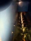 Used Screw pellet cooling conveyor. Bottom perforated holes, top hinged cover, side mounted blowers.