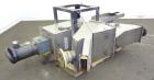 Used Carter Day Spin-Away Spin Dryer, Model CWM2, 304 Stainless Steel. Driven by a 5hp, 3/60/208230/460 volt, 1160 rpm motor. Includes an Agglomerate unit, model DAS2, and a carbon steel stand.