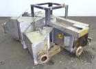 Used Carter Day Spin-Away Spin Dryer, Model CWM2, 304 Stainless Steel. Driven by a 5hp, 3/60/208230/460 volt, 1160 rpm motor. Includes an Agglomerate unit, model DAS2, and a carbon steel stand.