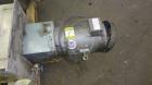 Used Carter Day Spin-Away Spin Dryer, Model CWM2, 304 Stainless Steel. Driven by a 5hp, 3/60/208230/460 volt, 1160 rpm motor. Includes an Agglomerate unit, model DAS2, and a carbon steel stand.