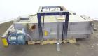 Used Carter Day Spin-Away Spin Dryer, Model DBA1, 304 Stainless Steel. Driven by a 5hp, 3/60/230/460 volt, 1730 rpm motor. Includes an Agglomerate unit, model AU200, and a carbon steel stand.