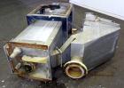 Used Carter Day Spin-Away Spin Dryer, Model DBA2, 304 Stainless Steel. Driven by a 5hp, 3/60/230/460 volt, 1730 rpm motor. Includes an Agglomerate unit, model AU200, and a carbon steel stand.