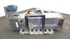 Used Carter Day Spin-Away Spin Dryer, Model DBA2, 304 Stainless Steel. Driven by a 5hp, 3/60/230/460 volt, 1715 rpm motor. Includes an Agglomerate unit, model AU200, and a carbon steel stand.