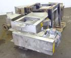 Used Carter Day Spin-Away Spin Dryer, Model DBA2, 304 Stainless Steel. Driven by a 5hp, 3/60/230/460 volt, 1730 rpm motor. Includes an Agglomerate unit, model AU200, and a carbon steel stand.
