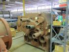 Used Werner Pfleiderer Twin Screw Gearboxes (3) and Thrust Bearing Assemblies.  Additional parts include one base for 160 mm.  Lot various barrels, heaters, shafts, screw elements and barrel supports.