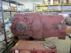 Used Werner Pfleiderer Twin Screw Gearboxes (3) and Thrust Bearing Assemblies.  Additional parts include one base for 160 mm.  Lot various barrels, heaters, shafts, screw elements and barrel supports.