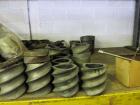 Used Werner Pfleiderer Twin Screw Gearboxes (3) and Thrust Bearing Assemblies.  Additional parts include one base for 160 mm.  Lot various barrels, heaters, shafts, screw elements and barrel supports.