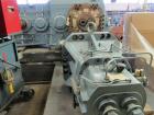 Used Werner Pfleiderer Twin Screw Gearboxes (3) and Thrust Bearing Assemblies.  Additional parts include one base for 160 mm.  Lot various barrels, heaters, shafts, screw elements and barrel supports.