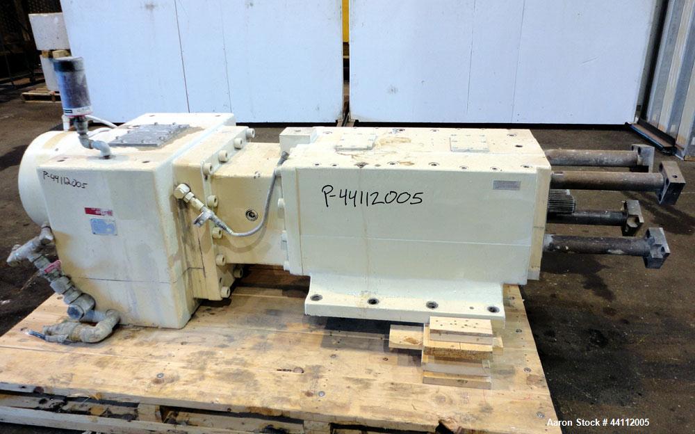 Used American Maplan 130mm Twin Screw Extruder Parts Consisting Of: (1) Thyssen TPM 3-130-D05-V70 Gear Box, serial# 6 343 3131/10 GB-70036, built 2000. (1) 130mm Twin Screw Set, Screw Type 055.13.100...