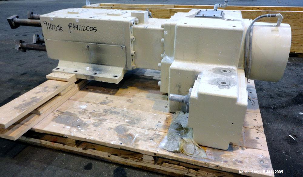 Used American Maplan 130mm Twin Screw Extruder Parts Consisting Of: (1) Thyssen TPM 3-130-D05-V70 Gear Box, serial# 6 343 3131/10 GB-70036, built 2000. (1) 130mm Twin Screw Set, Screw Type 055.13.100...