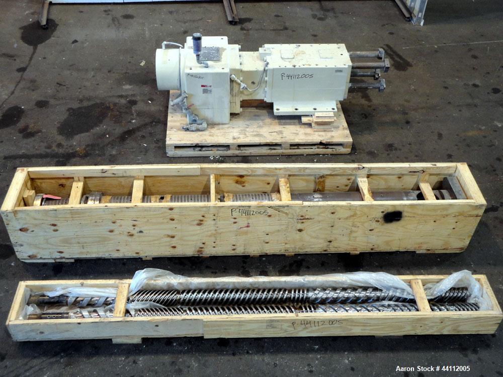 Used American Maplan 130mm Twin Screw Extruder Parts Consisting Of: (1) Thyssen TPM 3-130-D05-V70 Gear Box, serial# 6 343 3131/10 GB-70036, built 2000. (1) 130mm Twin Screw Set, Screw Type 055.13.100...