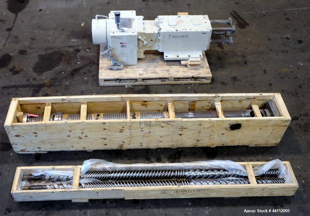Used American Maplan 130mm Twin Screw Extruder Parts Consisting Of: (1) Thyssen TPM 3-130-D05-V70 Gear Box, serial# 6 343 3131/10 GB-70036, built 2000. (1) 130mm Twin Screw Set, Screw Type 055.13.100...
