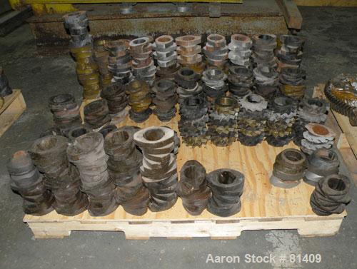 Used Werner & Pfleiderer ZSK-120 MM Twin Screw Extruder Parts Consisting Of: (2) Screw shafts, and approximately 280 miscellaneous screw segments.