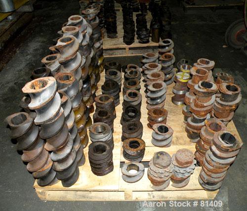 Used Werner & Pfleiderer ZSK-120 MM Twin Screw Extruder Parts Consisting Of: (2) Screw shafts, and approximately 280 miscellaneous screw segments.