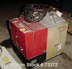 Used Meltex Corporation Hot Melt Applicator, Model GR2201. 60/230 volt, 4700 watts. Designed to handle hot melts having a viscosity of up to 200,000 cps. Driven by a DC motor.
