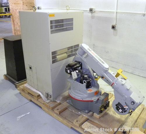 Used Motoman Versitle High-Speed Industrial Robot, Model HP20-A0. (6) Controlled axis, payload 20 kg, V-reach 3063mm, H-reach 1717mm, repeatability+/- 0.06mm. Vertical jointed arm type. Includes a NX...