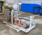 Used Lube Systems Inc. Water System. Consisting of pump, tank and heat exchanger. Mounted on a carbon steel frame.