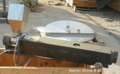 Used C.W. Brabender 1" Single Screw Extruder, type 125-30 HC.  4 zone, approximate 37:1 L/D.  6" x 6" feed hopper.  Driven by a 1/4 hp, 90 volt, 1725 rpm DC adjustable speed motor.  Includes a contro...