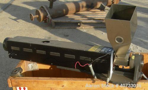Used C.W. Brabender 1" Single Screw Extruder, type 125-30 HC.  4 zone, approximate 37:1 L/D.  6" x 6" feed hopper.  Driven by a 1/4 hp, 90 volt, 1725 rpm DC adjustable speed motor.  Includes a contro...