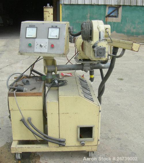 Used-Actual .8" pedestal mounted single screw co-extruder, model AE22. Approximately 24 to 1 L/D ratio. Electrically heated,...
