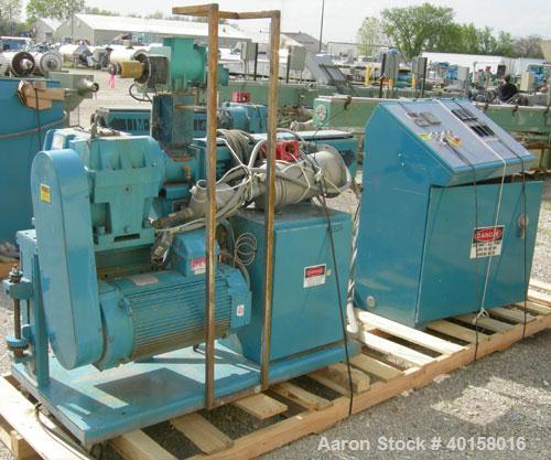 Used Akron 1 3/4" Single Screw Extruder, model M-PAK175, approximately 24 to 1 L/D ratio. Electrically heated, air cooled, 3 zone non-vented barrel. Water cooled feed throat with a lump breaker, no h...