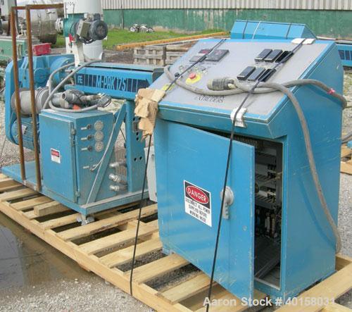 Used Akron 1 3/4" single screw extruder, model M-PAK175, approximately 24 to 1 L/D ratio. Electrically heated, air cooled 3 zone non-vented barrel. Water cooled feed throat with a lump breaker, no ho...