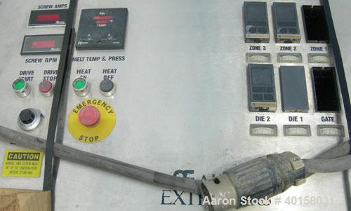 Used Akron 1 3/4" single screw extruder, model M-PAK175, approximately 24 to 1 L/D ratio. Electrically heated, air cooled 3 zone non-vented barrel. Water cooled feed throat with a lump breaker, no ho...